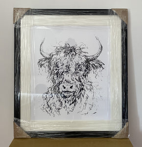 Squiggle the Cow Framed Print